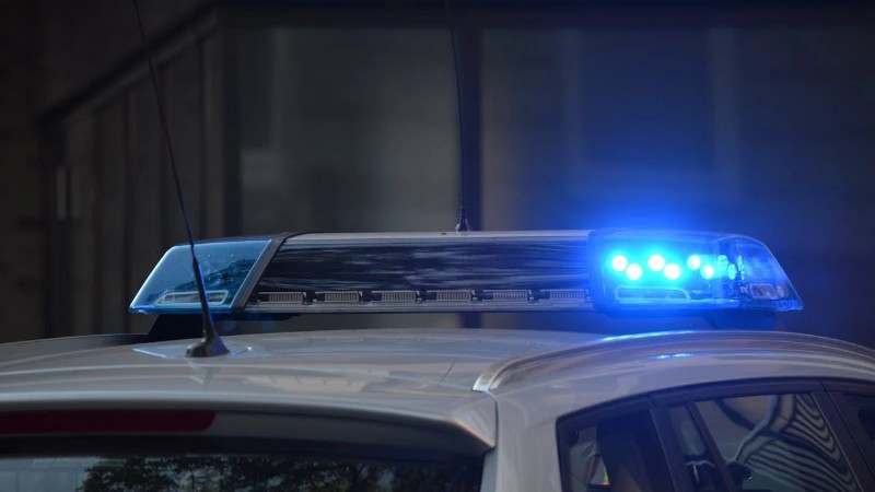 Close-up of a police car's flashing blue lights in an urban environment., tags: deutschland - pexel